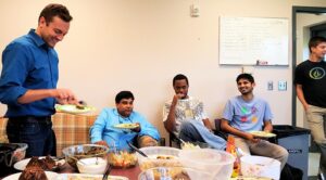 Dr. Seal and students having catered lunch