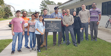 Dr. Seal with students in front of AMPAC